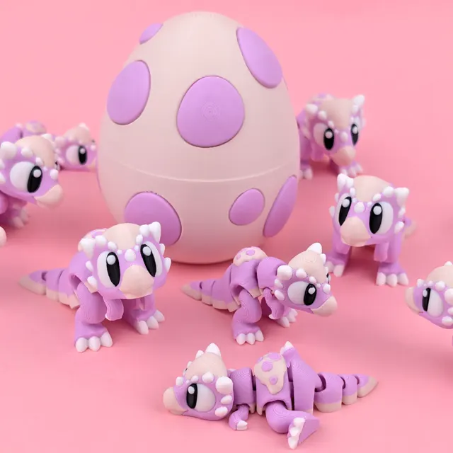 Dinossauro com ovo articulado impresso em 3D
